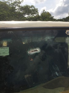 A bullet sliced through the client’s windshield