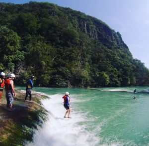 Seven stunning waterfalls punctuate the Mico River allowing adventurous travelers a chance to jump and swim. Photo © ATTA / Casey Hanisko