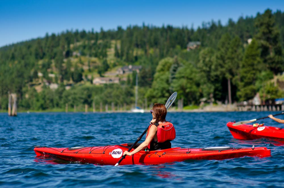 Lake Coeur d’Alene features more than 100 miles of shoreline. Explore crystal clear waters and learn about local Native peoples and history during a kayaking Day of Adventure. © ROW Adventures
