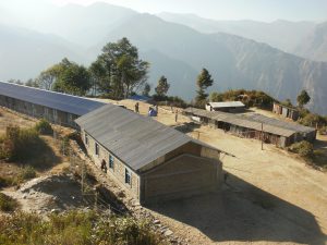 Temporary classrooms constructed at the site of Shree Manjushree Secondary School help accommodate the 365 children affected by the damage.