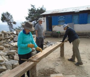 Travellers help to rebuild a primary school in Lura village, in the Solu Khumbu region of eastern Nepal in the fall of 2015.